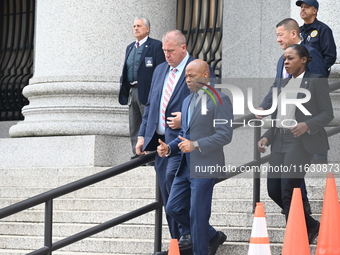 Mayor of New York City Eric Adams departs Thurgood Marshall United States Courthouse following a court appearance on federal charges of brib...