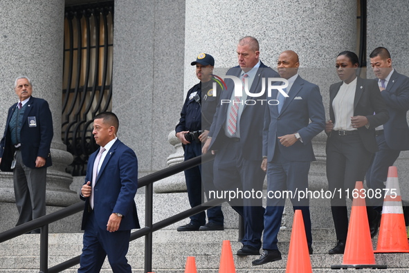 Mayor of New York City Eric Adams departs Thurgood Marshall United States Courthouse following a court appearance on federal charges of brib...