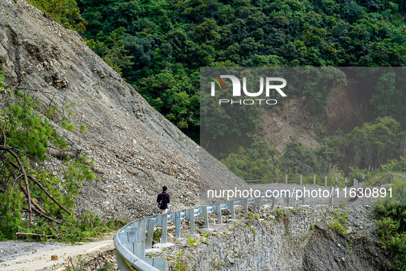 Due to heavy rainfall, the landslide damages the Dakshinkali-Sisneri road in Sisneri, Makwanpur, Nepal, on October 2, 2024. People have to r...