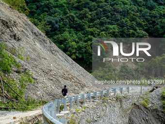 Due to heavy rainfall, the landslide damages the Dakshinkali-Sisneri road in Sisneri, Makwanpur, Nepal, on October 2, 2024. People have to r...