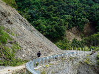 Due to heavy rainfall, the landslide damages the Dakshinkali-Sisneri road in Sisneri, Makwanpur, Nepal, on October 2, 2024. People have to r...