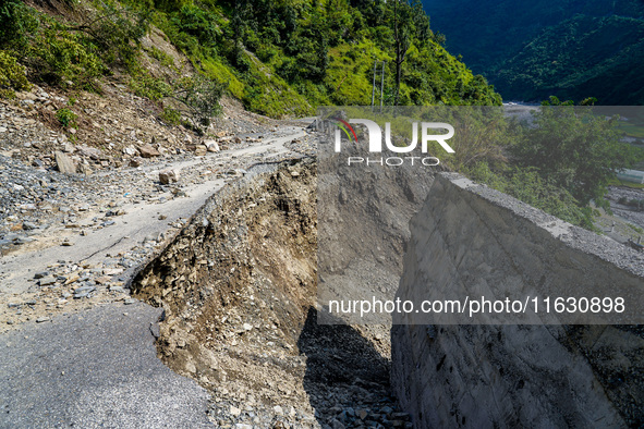 Due to heavy rainfall, the landslide damages the Dakshinkali-Sisneri road in Sisneri village, Makwanpur, Nepal, on October 2, 2024. 