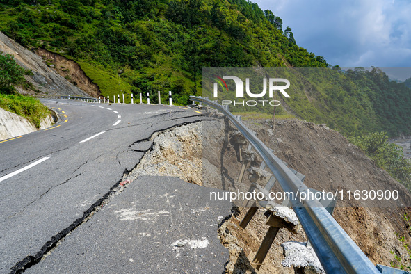 Due to heavy rainfall, the landslide damages the Dakshinkali-Sisneri road in Sisneri village, Makwanpur, Nepal, on October 2, 2024. 