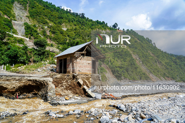 The flooding of the Kulekhani River damages homes and riverbanks in Sisneri, Makwanpur, Nepal, on October 2, 2024. Thirty-one homes are comp...