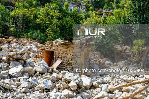 The flooding of the Kulekhani River damages homes and riverbanks in Sisneri, Makwanpur, Nepal, on October 2, 2024. Thirty-one homes are comp...