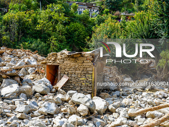 The flooding of the Kulekhani River damages homes and riverbanks in Sisneri, Makwanpur, Nepal, on October 2, 2024. Thirty-one homes are comp...