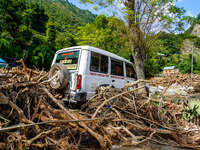 The flooding of the Kulekhani River damages homes and vehicles in Sisneri, Makwanpur, Nepal, on October 2, 2024. (