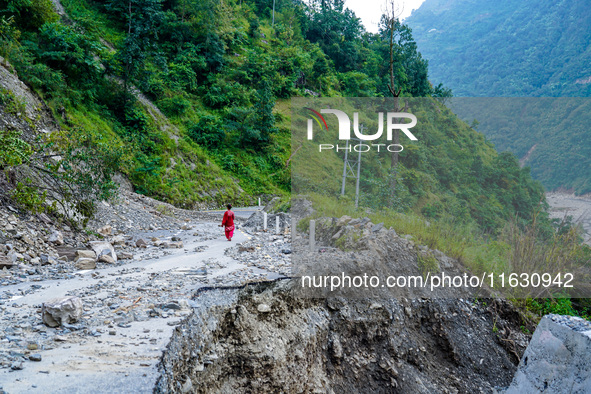 Due to heavy rainfall, the landslide damages Dakshinkali-Sisneri road in Sisneri village, Makwanpur, Nepal, on October 2, 2024. People have...