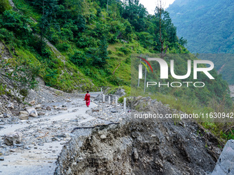 Due to heavy rainfall, the landslide damages Dakshinkali-Sisneri road in Sisneri village, Makwanpur, Nepal, on October 2, 2024. People have...