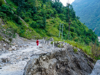 Due to heavy rainfall, the landslide damages Dakshinkali-Sisneri road in Sisneri village, Makwanpur, Nepal, on October 2, 2024. People have...