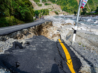 Due to heavy rainfall, the Kulekhani River flood damages the Dakshinkali-Sisneri road in Sisneri, Makwanpur, Nepal, on October 2, 2024. (