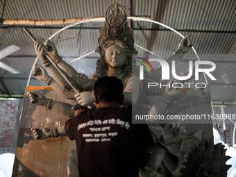 Artisans make idols ahead of Durga Puja in Dhaka, Bangladesh, on October 2, 2024. (