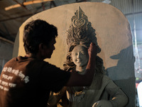 Artisans make idols ahead of Durga Puja in Dhaka, Bangladesh, on October 2, 2024. (