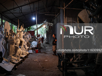 Artisans make idols ahead of Durga Puja in Dhaka, Bangladesh, on October 2, 2024. (