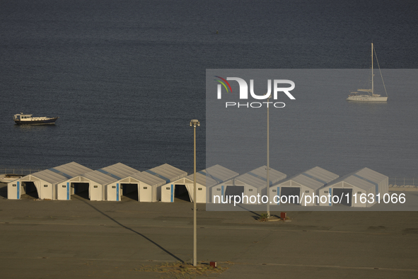 Tents erected by Cypriot authorities to process possible evacuees from Lebanon are seen at the port of Larnaca. Cyprus, Wednesday, October 2...