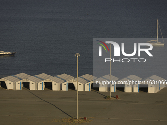 Tents erected by Cypriot authorities to process possible evacuees from Lebanon are seen at the port of Larnaca. Cyprus, Wednesday, October 2...