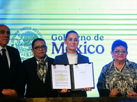 Claudia Sheinbaum Pardo, the first female President of Mexico, signs her first decree, a public apology for the student massacre of 1968, an...