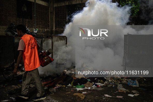 Mosquito repellent is sprayed by a fogger machine to kill mosquitoes as the case of Dengue (spread usually by Aedes mosquito) in Dhaka, Bang...