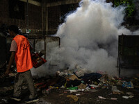 Mosquito repellent is sprayed by a fogger machine to kill mosquitoes as the case of Dengue (spread usually by Aedes mosquito) in Dhaka, Bang...