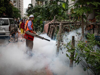 Mosquito repellent is sprayed by a fogger machine to kill mosquitoes as the case of Dengue (spread usually by Aedes mosquito) in Dhaka, Bang...