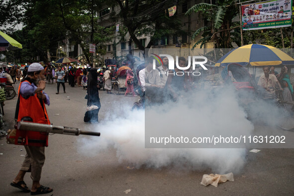 Mosquito repellent is sprayed by a fogger machine to kill mosquitoes as the case of Dengue (spread usually by Aedes mosquito) in Dhaka, Bang...