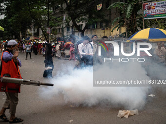 Mosquito repellent is sprayed by a fogger machine to kill mosquitoes as the case of Dengue (spread usually by Aedes mosquito) in Dhaka, Bang...