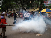 Mosquito repellent is sprayed by a fogger machine to kill mosquitoes as the case of Dengue (spread usually by Aedes mosquito) in Dhaka, Bang...