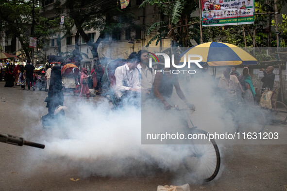 Mosquito repellent is sprayed by a fogger machine to kill mosquitoes as the case of Dengue (spread usually by Aedes mosquito) in Dhaka, Bang...