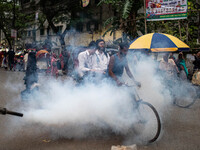 Mosquito repellent is sprayed by a fogger machine to kill mosquitoes as the case of Dengue (spread usually by Aedes mosquito) in Dhaka, Bang...