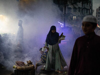 Mosquito repellent is sprayed by a fogger machine to kill mosquitoes as the case of Dengue (spread usually by Aedes mosquito) in Dhaka, Bang...