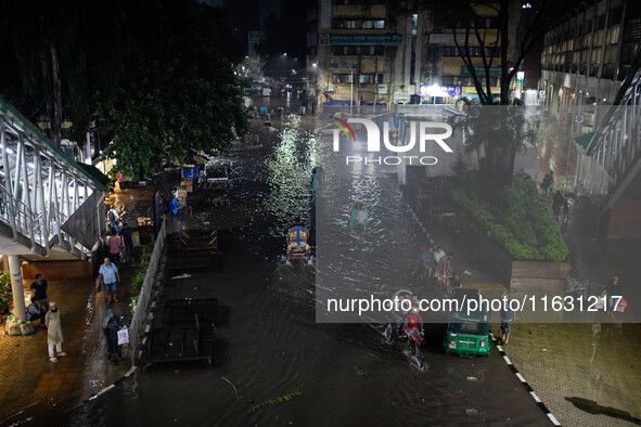 Multiple areas of the city, including many thoroughfares, are waterlogged following prolonged torrential rain in the evening on October 2, 2...