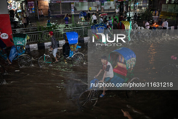 Multiple areas of the city, including many thoroughfares, are waterlogged following prolonged torrential rain in the evening on October 2, 2...