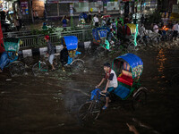 Multiple areas of the city, including many thoroughfares, are waterlogged following prolonged torrential rain in the evening on October 2, 2...