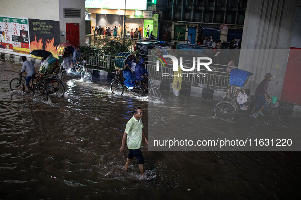 Multiple areas of the city, including many thoroughfares, are waterlogged following prolonged torrential rain in the evening on October 2, 2...