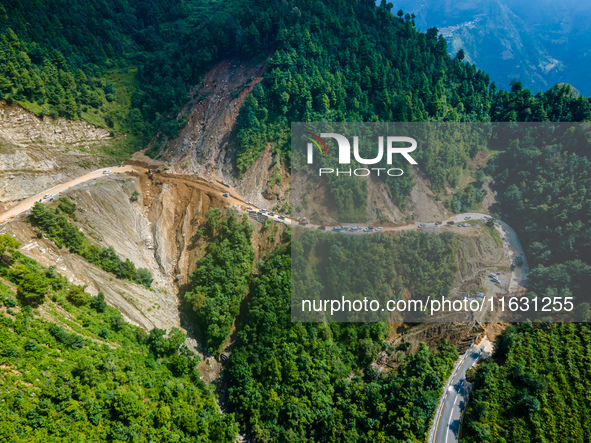 An aerial view shows roadblocks on the Dakshinkali-Sisneri road caused by landslides due to heavy rainfall in Sisneri, Makwanpur, Nepal, on...