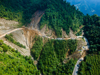 An aerial view shows roadblocks on the Dakshinkali-Sisneri road caused by landslides due to heavy rainfall in Sisneri, Makwanpur, Nepal, on...