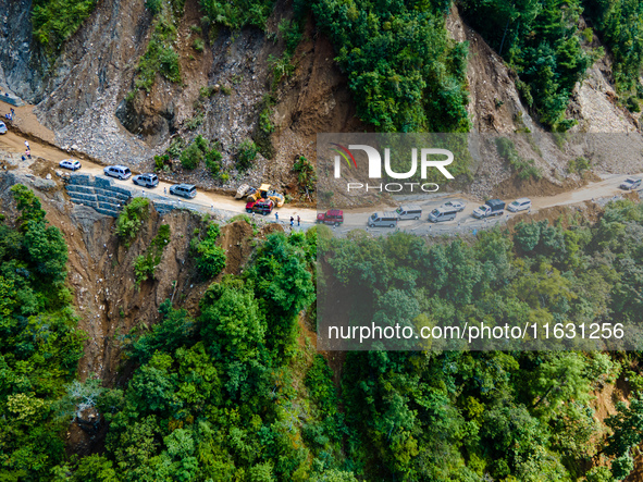 An aerial view shows roadblocks on the Dakshinkali-Sisneri road caused by landslides due to heavy rainfall in Sisneri, Makwanpur, Nepal, on...