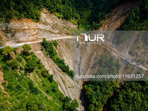 An aerial view shows roadblocks on the Dakshinkali-Sisneri road caused by landslides due to heavy rainfall in Sisneri, Makwanpur, Nepal, on...