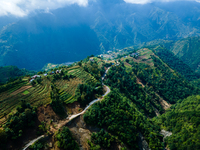 An aerial view shows roadblocks on the Dakshinkali-Sisneri road caused by landslides due to heavy rainfall in Sisneri, Makwanpur, Nepal, on...