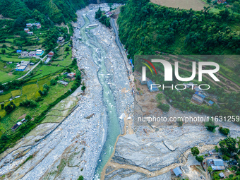 The aerial view shows the flood-affected areas of the Kulekhani River in the Sisneri region of Makwanpur, Nepal, on October 2, 2024. Thirty-...