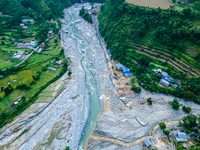 The aerial view shows the flood-affected areas of the Kulekhani River in the Sisneri region of Makwanpur, Nepal, on October 2, 2024. Thirty-...