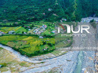 The aerial view shows the flood-affected areas of the Kulekhani River in the Sisneri region of Makwanpur, Nepal, on October 2, 2024. Thirty-...