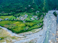 The aerial view shows the flood-affected areas of the Kulekhani River in the Sisneri region of Makwanpur, Nepal, on October 2, 2024. Thirty-...