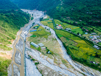 The aerial view shows the flood-affected areas of the Kulekhani River in the Sisneri region of Makwanpur, Nepal, on October 2, 2024. Thirty-...