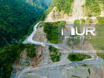 An aerial view shows roadblocks on the Dakshinkali-Sisneri road caused by landslides due to heavy rainfall in Sisneri, Makwanpur, Nepal, on...