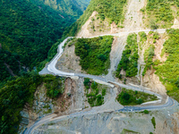 An aerial view shows roadblocks on the Dakshinkali-Sisneri road caused by landslides due to heavy rainfall in Sisneri, Makwanpur, Nepal, on...