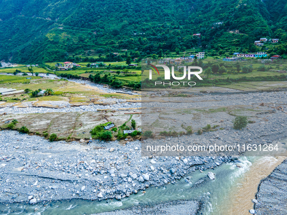 The aerial view shows the flood-affected areas of the Kulekhani River in the Sisneri region of Makwanpur, Nepal, on October 2, 2024. Thirty-...