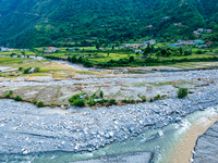 The aerial view shows the flood-affected areas of the Kulekhani River in the Sisneri region of Makwanpur, Nepal, on October 2, 2024. Thirty-...