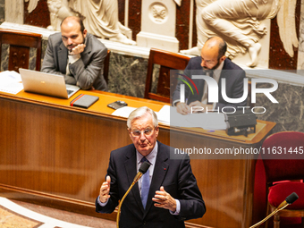 In Paris, France, on October 2, 2024, French Prime Minister Michel Barnier speaks at the National Assembly during a session of questions to...