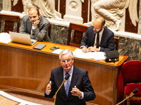 In Paris, France, on October 2, 2024, French Prime Minister Michel Barnier speaks at the National Assembly during a session of questions to...